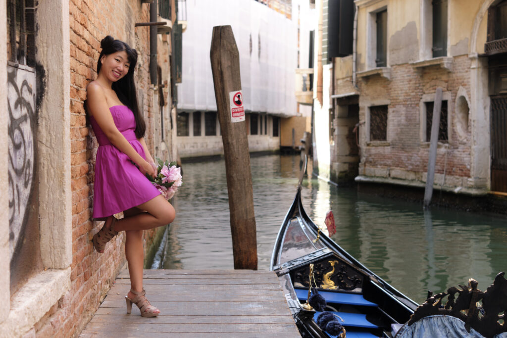 Beautiful woman at Venice canals 