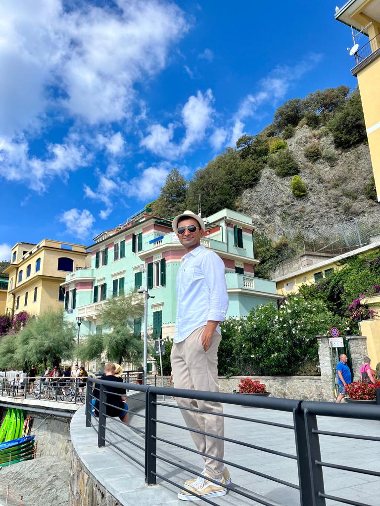 Deeshen enjoying the picturesque charm of Monterosso al Mare, one of the beautiful villages in Cinque Terre, Italy.